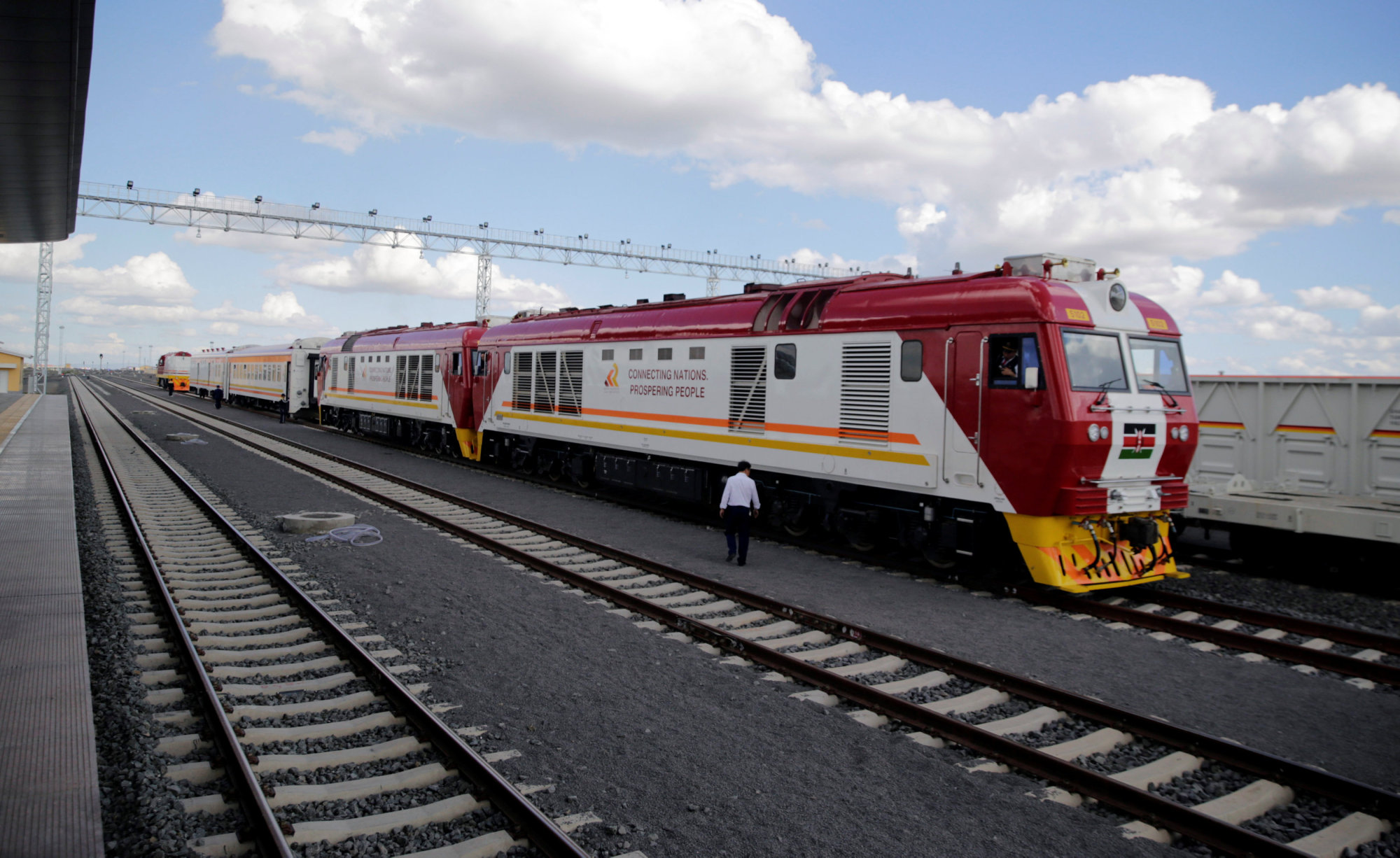 A train launched to operate on the Standard Gauge Railway (SGR) line constructed by the China Road and Bridge Corporation (CRBC) and financed by the Chinese government arrives at the Nairobi Terminus on the outskirts of Kenya's capital Wednesday. | REUTERS