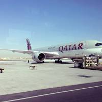 A parked Qatari plane is seen Tuesday in Hamad International Airport (HIA) in Doha. Qatar\'s foreign minister says Kuwait is trying to mediate a diplomatic crisis in which Arab countries have cut diplomatic ties and moved to isolate his energy-rich, travel-hub nation from the outside world. | AP