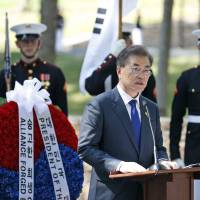 South Korean President Moon Jae-in speaks in front of the \"Chosin Few Battle Monument\" at the National Museum of the Marine Corps, Wednesday in Triangle, Virginia. | AP