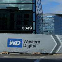 A Western Digital office building is seen being built in Irvine, California. The firm reportedly plans to present Toshiba with a revised offer for its memory chip unit next week. | REUTERS