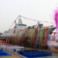 China’s new type of domestically built destroyer, a 10,000-ton warship, is seen during its launching ceremony at the Jiangnan Shipyard in Shanghai on Wednesday. Chinese Navy launches most advanced homegrown destroyer
