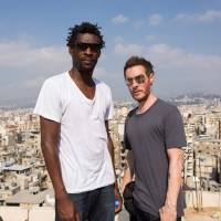 Robert “3D” Del Naja (right) and Grantley “Daddy G” Marshall of the British trip-hop band Massive Attack visit the Burj al-Barajneh camp for Palestinian refugees south of Beirut in July 2014. DJ's comment fuels speculation that elusive artist Banksy may be Massive Attack musician Robert Del Naja