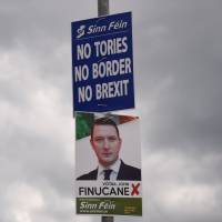 Sinn Fein election posters featuring John Finucane stand in Belfast, Northern Ireland, on May 19. U.K. election exposes Northern Ireland's deep divisions