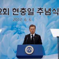 South Korean President Moon Jae-in delivers a speech during a ceremony marking Korean Memorial Day at the National Cemetery in Seoul on June 6. | REUTERS