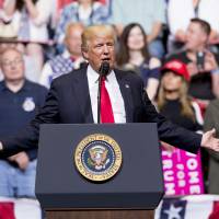 U.S. President Donald Trump speaks Wednesday during a rally in Cedar Rapids, Iowa. Trump's new idea: a 'solar wall' on the Mexican border