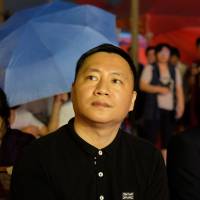 Chinese dissident Wang Dan looks on in Taipei on Sunday during an event marking the 28th anniversary of the 1989 Tiananmen crackdown in Beijing. Dozens gathered in downtown Taipei to commemorate the atrocity and to call for China to release detained activists. Learn from us on democracy, Taiwan tells China on Tiananmen anniversary