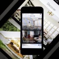 The Airbnb Inc. app is displayed on an Apple Inc. iPhone and iPad in this arranged photograph taken in 2014. | BLOOMBERG