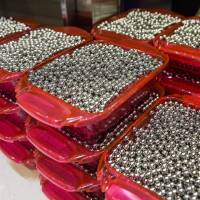Pachinko balls sit on floor at a pachinko parlor in Tokyo on May 16. | BLOOMBERG