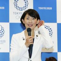 Olympic minister Tamayo Marukawa explains the design competition selection process for the official mascot of the 2020 Tokyo Games during a news conference in May. | KYODO