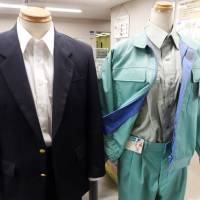 Clothes made from recycled PET fibers are displayed at the Minato Resource Recycle Center in Tokyo. | TIM HORNYAK