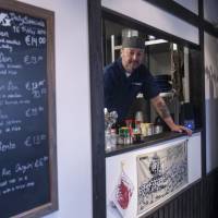 Simple pleasures: Chef Takashi Miyazaki stands at the counter of his restaurant in Cork. | MARTIN O\'DONOGHUE
