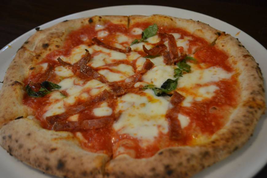Da Yuki Hot fire: Da Yuki's Diavola pizza includes tōgarashi peppers, spicy salami, mozzarella, basil and parmesan cheese. | J.J. O'DONOGHUE