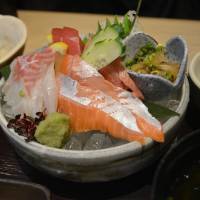 Taste test: Cuts of bluefin tuna, bream and cherry salmon at Kinki Daigaku Suisan Kenkyujo. Kinki Daigaku Suisan Kenkyujo