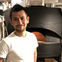 Owner Tsubasa Tamaki cut his teeth as a pizzaiolo at the much-lauded Savoy in Azabu-Juban. | ROBBIE SWINNERTON