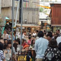 Heat-beaters: Beer enthusiasts kick back during a Tokyo Beer Week event at Commune 2nd. Tokyo Beer Week underway with events across Tokyo and Kanagawa