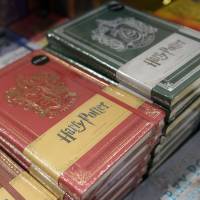 Special 20th anniversary edition Harry Potter books are displayed for sale in a book store in Edinburgh, Scotland, on Monday. At platform 9¾, Harry Potter fans mark 20 years of magic