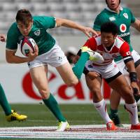 Ireland\'s Cian Healy runs with the ball against Japan on Saturday. | REUTERS