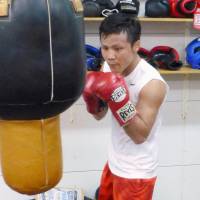 WBC flyweight champion Daigo Higa trains at his boxing gym on Friday. | KYODO