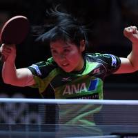 Miu Hirano competes against Feng Tianwei in the women\'s quarterfinals at  the World Table Tennis Championships on Friday in Duesseldorf, Germany. | AFP-JIJI