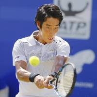 Yuichi Sugita competes against Marcos Baghdatis in the Antalya Open semifinals in Turkey on Friday. | GETTY / VIA KYODO
