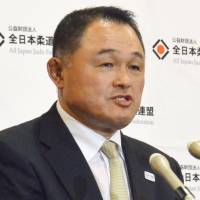 Yasuhiro Yamashita, the new All Japan Judo Federation chairman, speaks at a news conference on Friday. | KYODO