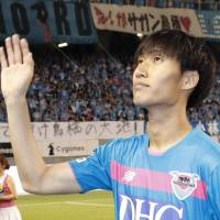 Daichi Kamada bids farewell to Sagan Tosu fans after his final game with the team on Sunday. | KYODO