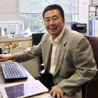 Edogawa University professor Itaru Kobayashi, seen in his office, is a leader in the push to modernize the nation\'s college sports. | KAZ NAGATSUKA