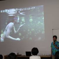 Tsuyoshi Shibamura of the Palau Visitors Authority Japan Office speaks about the country in the seminar on June 22 in Tokyo. | MASAAKI KAMEDA