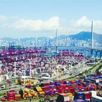 Modern and well-equipped container terminals help maintain Hong Kong\'s status of a major port of southern China. | INFORMATION SERVICES DEPARTMENT, HONG KONG SAR GOVERNMENT