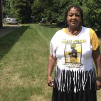 Deborah Chenault Green on July 6 discusses Detroit\'s 1967 riots from a vacant lot where her cousin\'s home once stood on the city\'s west side. Green, 62, was 12 years old and spending the night at the home when the riot started on July 23, 1967. \"The national guard was going into people\'s houses,\" Green said. \"I could remember the first time I heard a tank coming down 12th Street. It scared us to death because it shook everything. I always heard shooting during that time. During the riots was the first time we learned how to hit the floor when we heard gunfire.\" | AP
