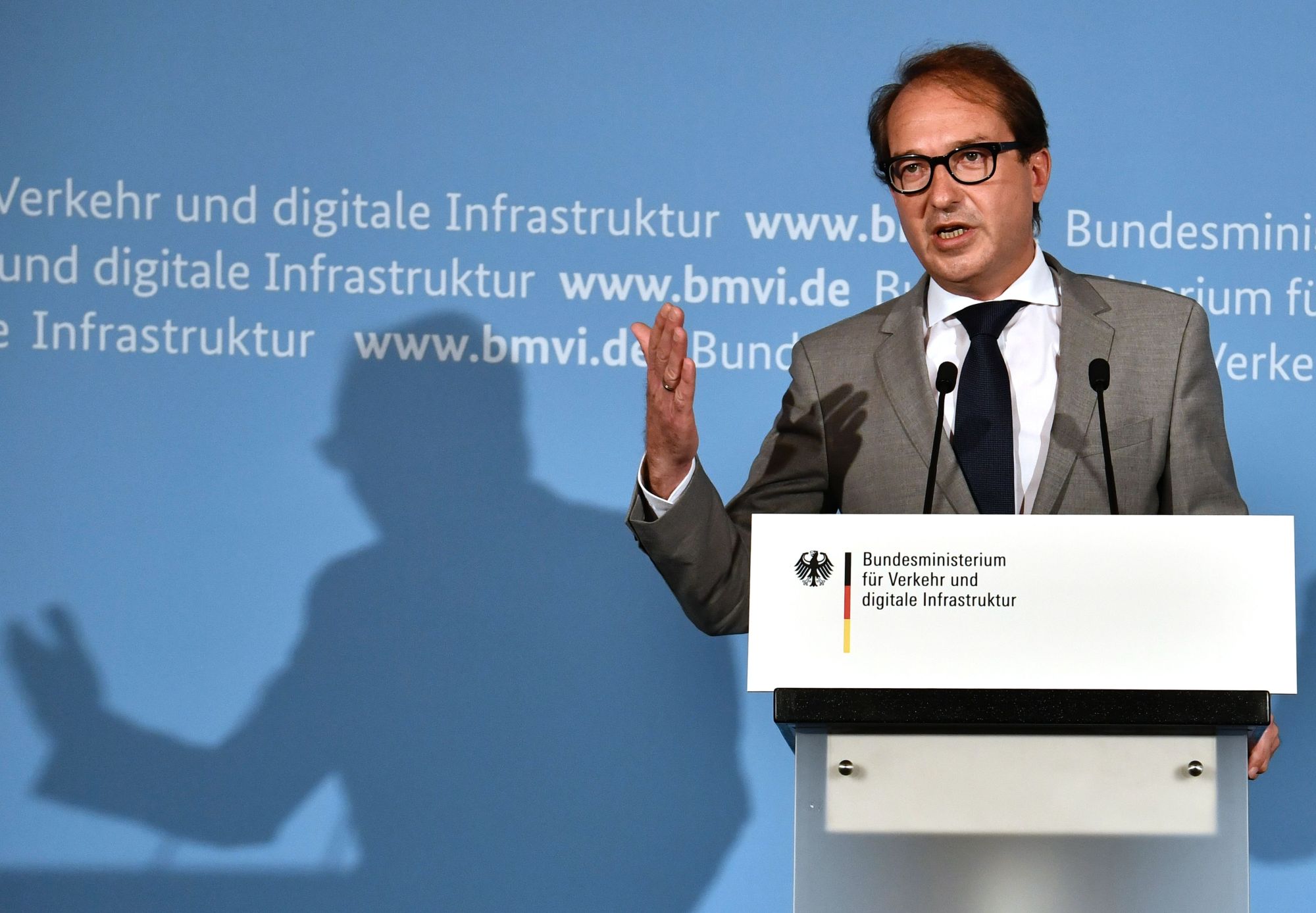 German Transport minister Alexander Dobrindt attends a news conference in Berlin on Thursday amid scandals around diesel emissions and a suspected carmaker's cartel involving Germany's top brands. | AFP-JIJI