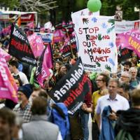 Protesters against climate and trade policies demonstrate Sunday in Hamburg, Germany, ahead of the G-20 summit in the city later this week. As G-20 leaders gather in Germany, trade and climate likely to top agenda