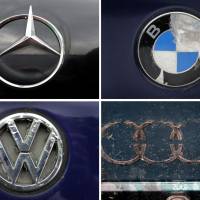 A combo photo shows damaged logos and logo traces of German car brands at a scrap yard in Betzigau, Germany on Tuesday. Clockwise from top left: Mercedes-Benz by Daimler, BMW, Audi and Volkswagen.
Der Spiegel magazine reported on July 21 that Volkswagen, Audi, Porsche, BMW and Daimler had secretly worked together from the 1990s onwards on issues including polluting emissions from diesel vehicles. Germany's top automakers sued in U.S. over two-decade tech-suppression 'cartel'