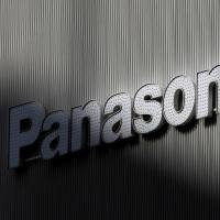 Panasonic\'s logo is seen on the wall of an electronics shop in Tokyo. | REUTERS