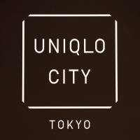 The logo for Fast Retailing Co.’s new headquarters building called Uniqlo City Tokyo is displayed inside the building in Tokyo on March 16. Uniqlo operator profit soars on brisk sales, cheap yen