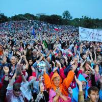 People attend a protest against judicial reforms in Poznan, Poland, on Monday. | AGENCJA GAZETA / LUKASZ CYNALEWSKI / VIA REUTERS