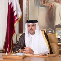 Emir of Qatar Sheikh Tamim bin Hamad al-Thani delivers a televised speech in Doha on Friday. Qatar's ruler voices willingness to talk to solve Arab rift