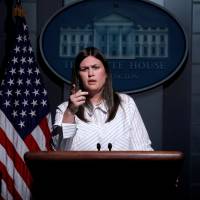 Deputy White House Press Secretary Sarah Huckabee Sanders holds the daily briefing at the White House in Washington Wednesday. | REUTERS