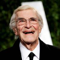 Actor Martin Landau smiles as he arrives at the 2012 Vanity Fair Oscar party in West Hollywood, California, in 2012. Landau died Sunday at age 89. | REUTERS