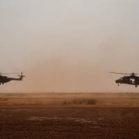 NH90 Caiman transport helicopters piloted by German soldiers take off Tuesday from Gao airport in Mali. A German helicopter with two crew on board crashed in northern Mali on Wednesday in an apparent accident while monitoring clashes for the peacekeeping force, U.N. sources told AFP. | AFP-JIJI