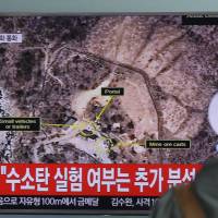 A man watches a TV news program reporting on North Korea\'s fifth nuclear test, at Seoul Railway Station in the South Korean capital on Sept. 9. | AP