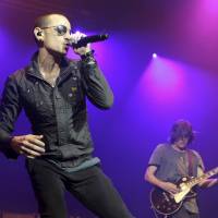 Chester Bennington sings during the MMRBQ Music Festival 2015 at the Susquehanna Bank Center in Camden, New Jersey. The Los Angeles County coroner says Bennington, who sold millions of albums with a unique mix of rock, hip-hop and rap, has died in his home near Los Angeles. He was 41. Coroner spokesman Brian Elias says they are investigating Bennington\'s death as an apparent suicide but no additional details are available. | OWEN SWEENEY / INVISION / VIA AP