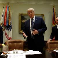 U.S. President Donald Trump, Vice President Mike Pence (left) and National Security Adviser H.R. McMaster arrive for a lunch meeting with service members at the White House in Washington Tuesday. | REUTERS
