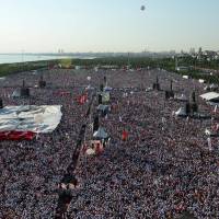 People gather for a rally to mark the end of the main opposition Republican People\'s Party (CHP) leader Kemal Kilicdaroglu\'s 25-day-long protest, dubbed \"Justice March\" against the detention of the party\'s lawmaker, Enis Berberoglu, in Istanbul, Sunday. | REUTERS