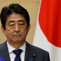 Prime Minister Shinzo Abe attends a joint news conference with Jordanian Prime Minister and Defense Minister Hani al-Mulki (not pictured) at the prime minister’s office in Tokyo on Friday. Abe's support rate slides to under 30%, poll says