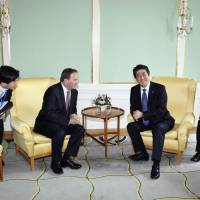Sweden’s Prime Minister Stefan Lofven (second from left) meets with Prime Minister Shinzo Abe in Stockholm on Sunday. Abe stops in Sweden to meet Lofven, reaffirm security ties after Stockholm attack