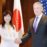 Defense Minister Tomomi Inada gets together with U.S. Defense Secretary Jim Mattis in Singapore last month. | KYODO