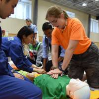 Foreign residents of Tokyo’s Minato Ward participate in a disaster preparedness event on Saturday. Minato Ward hosts first disaster seminar for foreign residents