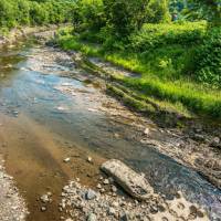 A Hokkaido stream is seen. Water, mountain accidents claim five lives over three-day weekend