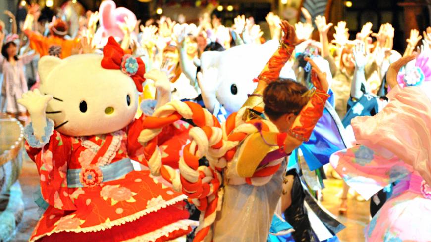 The cat’s meow: Characters from Sanrio’s Hello Kitty series take part in a nighttime odori (dance) at a previous Puroland festival. Summer Festival in Sanrio Puroland